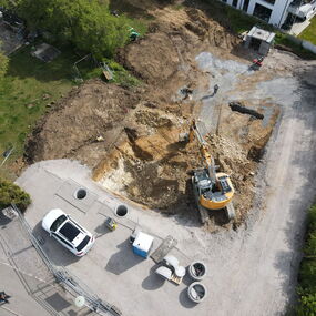 Neubau Mehrfamilienhaus Massivbau versetzte Ebenen Engen Hegau